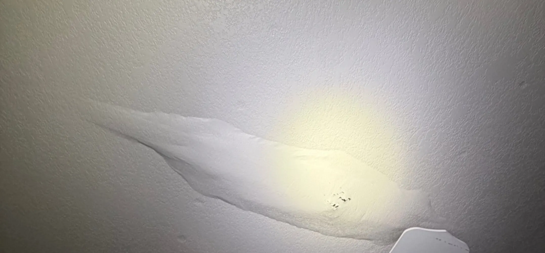 Before: Bedroom Ceiling Leak Repair & Retexture damage
