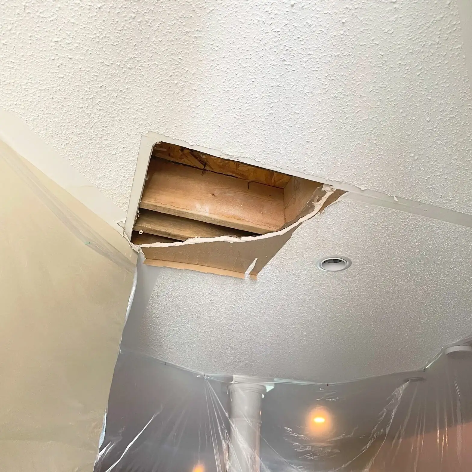 Living Room Ceiling Leak & Popcorn Texture Repair — Travis Heights, Austin