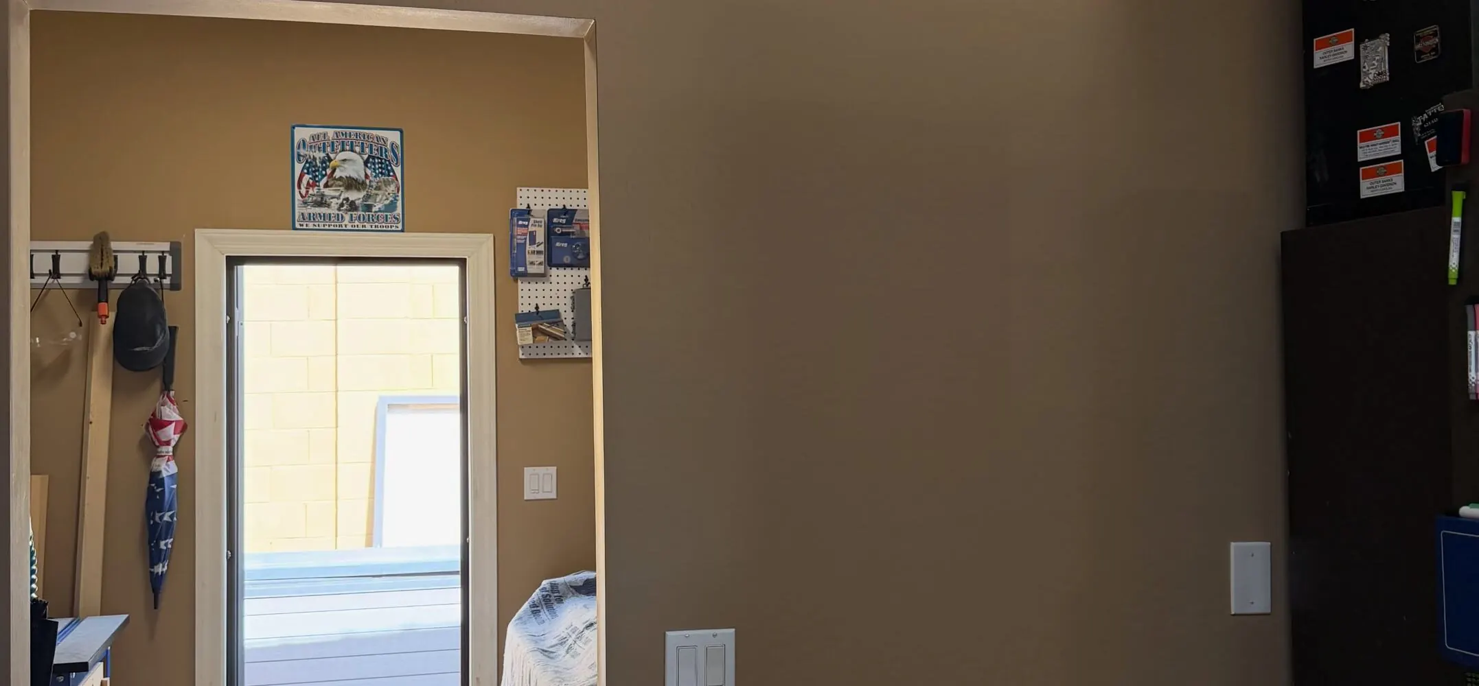 After: Water-Damaged Wall Rebuild — Retail Back Office completed